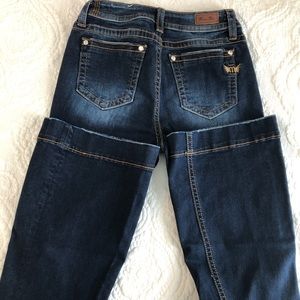 Dark wash, flare leg jeans. Like new